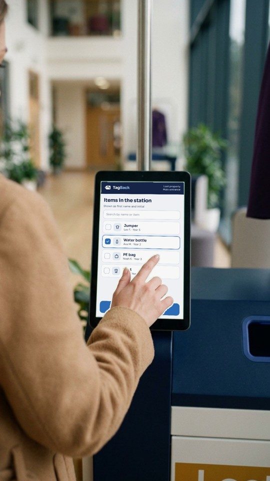 The station's touchscreen showing items waiting to be collected